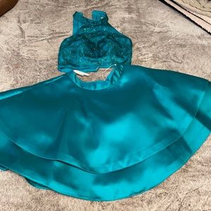 Gorgeous green designer homecoming dress.